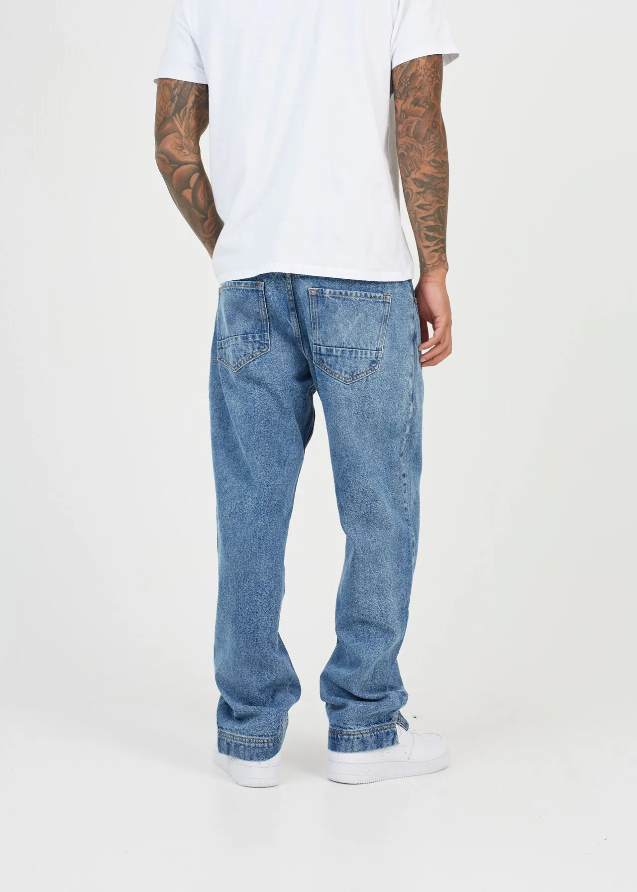 WIDE FIT LIGHT WASH JEAN WITH SPLIT HEM DETAIL